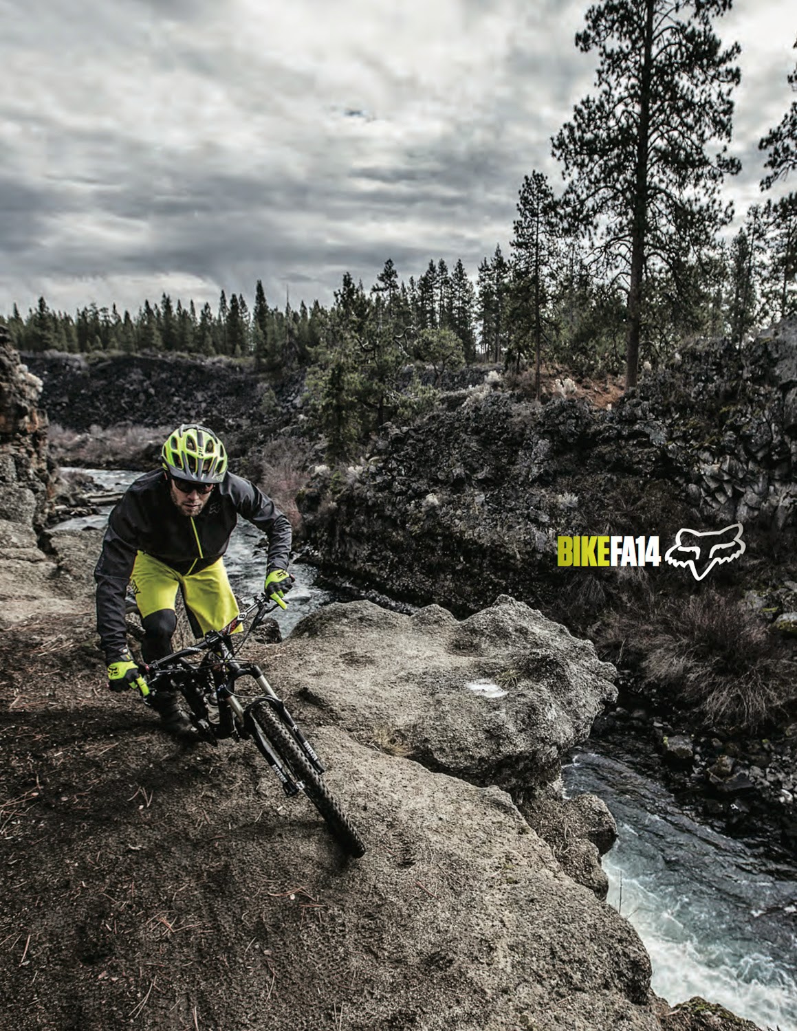 Kirt Voreis mountain bikes next to the Deschutes River in the new Fox Head Catalog. 
