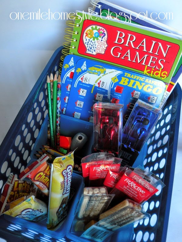 Road trip basket for kids - books, games and snacks