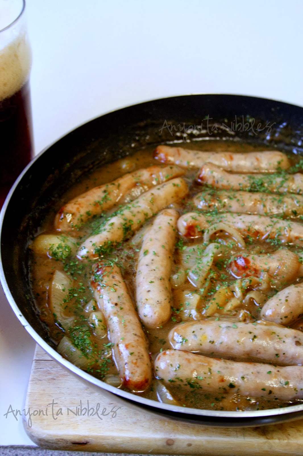 Chipolata sausages simmering in onion beer gravy for #StPatrick's Day dinner | Anyonita Nibbles