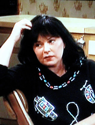 Roseanne from the TV Show Roseanne wearing an ugly sweater