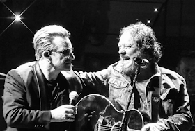 Zucchero with U2 lead singer Bono at a U2 concert in Turin in 2015