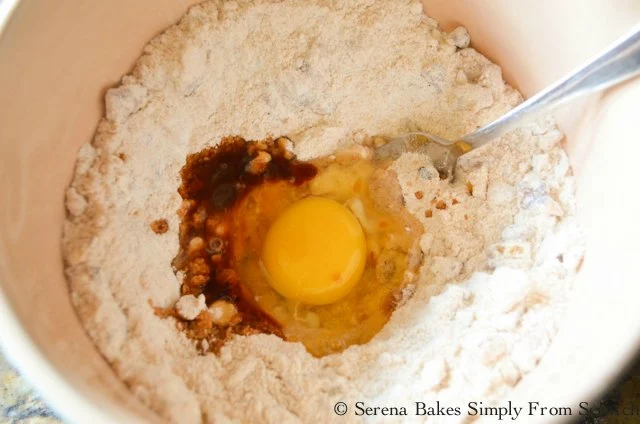 Pumpkin Cobbler Recipe mix in egg and vanilla from Serena Bakes Simply From Scratch.