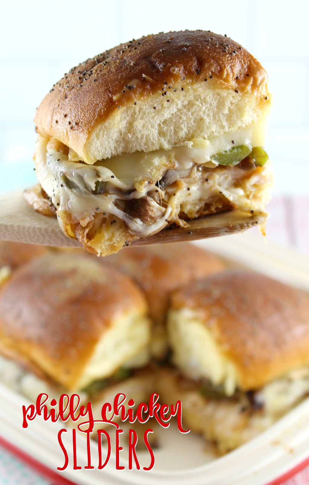 Chicken Philly Sliders are a delicious game-day favorite! Packed with all your favorites like tender chicken and sliced peppers, onions and mushrooms all smothered in provolone cheese! So delicious!
