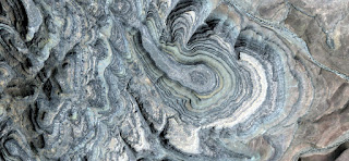 Concentric stone structures,,nature imitating art,composition,abstract landscapes of deserts,Abstract Naturalism,abstract photography deserts of Africa from the air,abstract surrealism,fantasy colors Concentric stone structures,,nature imitating art,composition,abstract landscapes of deserts,Abstract Naturalism,abstract photography deserts of Africa from the air,abstract surrealism,fantasy colors