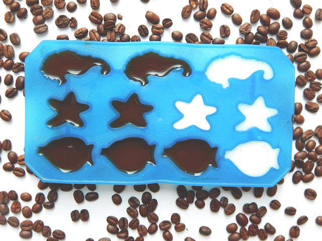 coffee and milk in an ice cube tray 