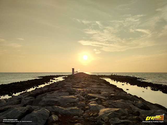 Sunset view from the breakwater rocks in Panambur Beach, Mangalore, Mangaluru, Dakshina Kannada, Karnataka, India