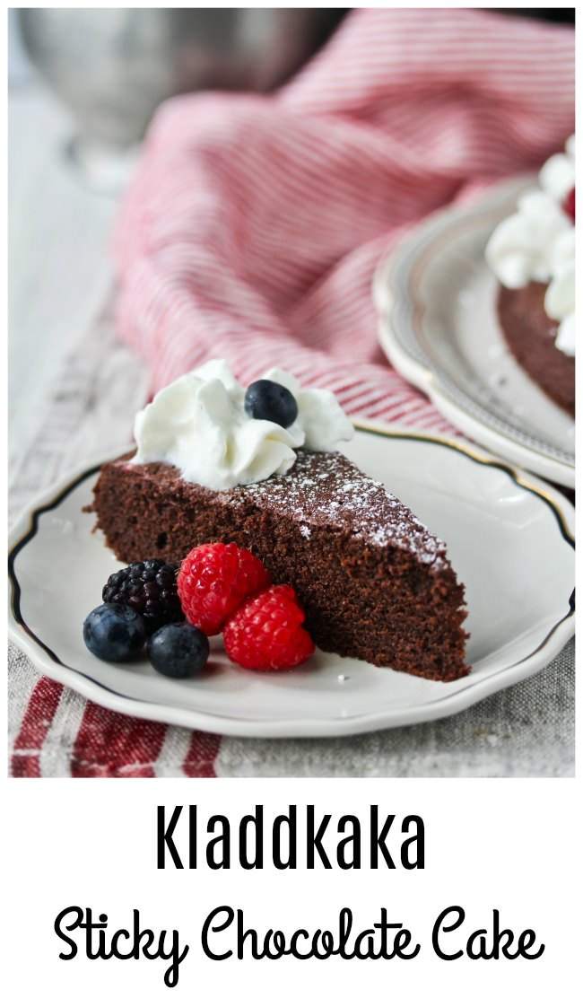 Swedish Sticky Chocolate Cake with whipped cream and berries