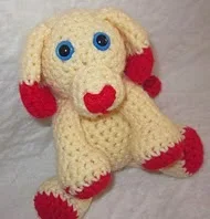 http://www.ravelry.com/patterns/library/mini-valentines-day-puppy