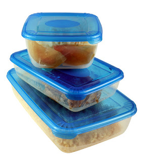Three food containers with leftovers