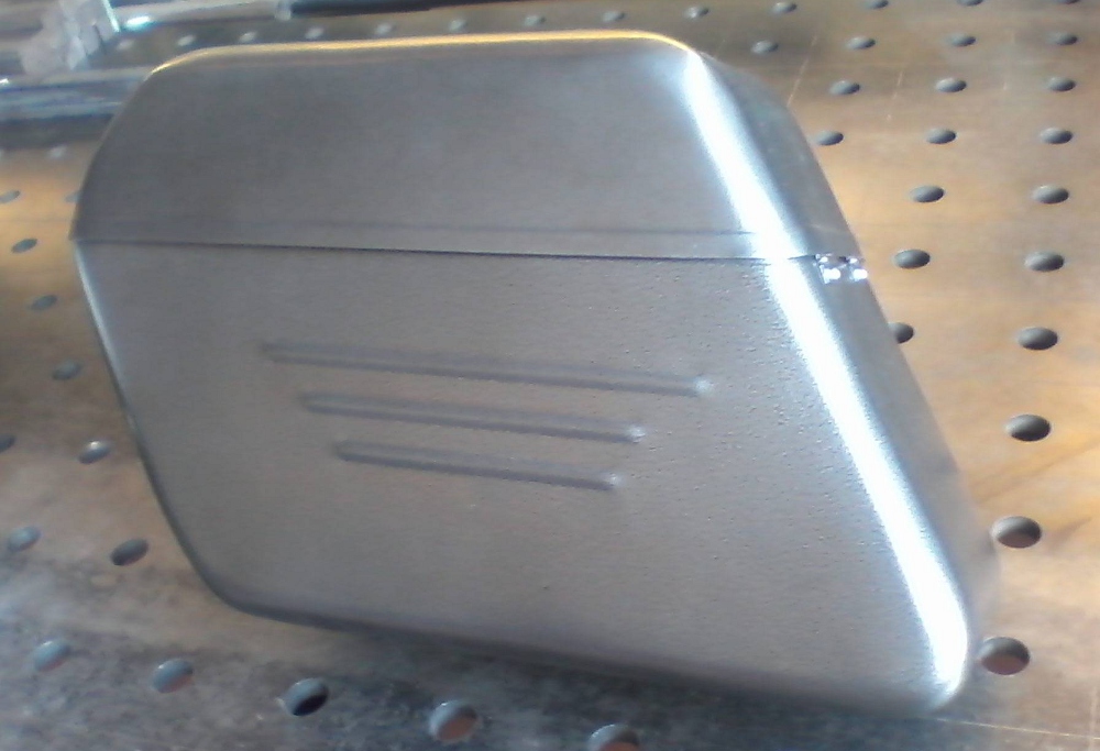 Handmade rigid metal saddlebags - The Chopper Compendium