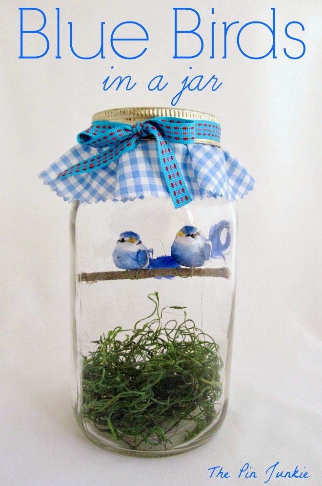 blue birds in a jar