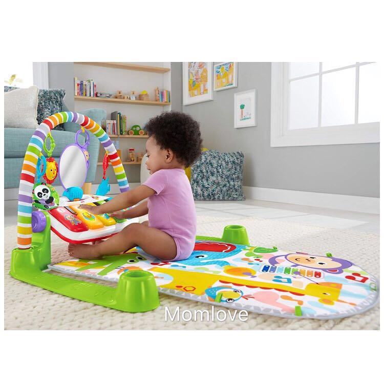 deluxe kick n play piano