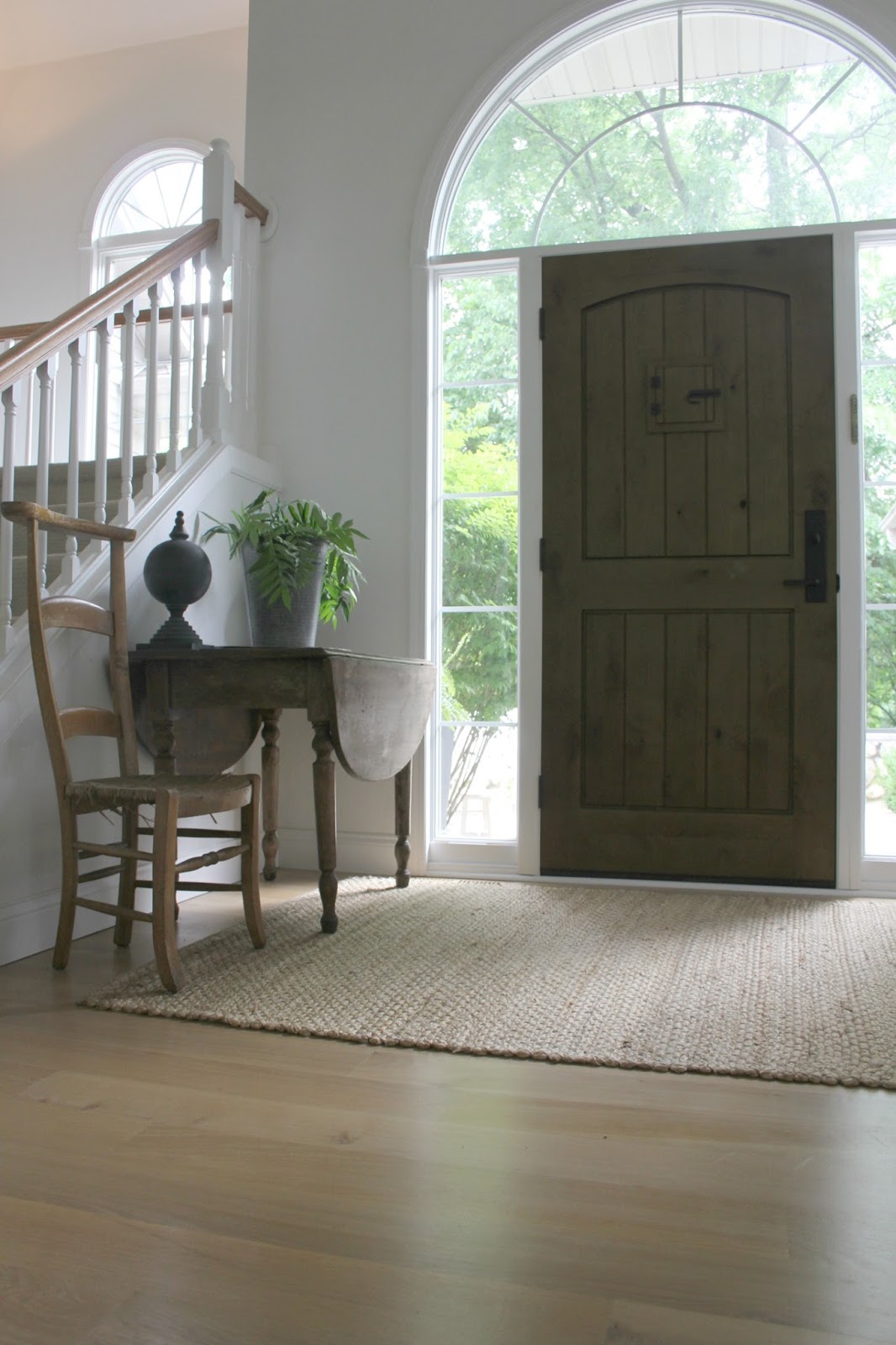 Rustic European country style in my entry with alder front door. Come tour my home and consider inexpensive approaches to simple decor.