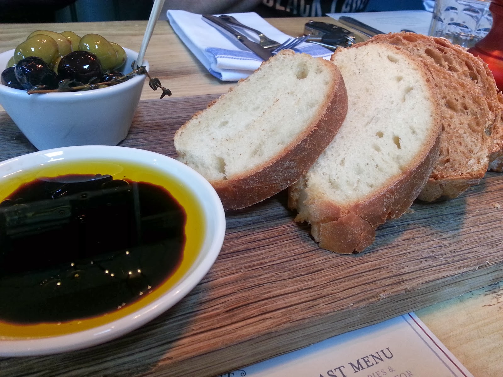 Bread and olives with balsamic and olive oil dip