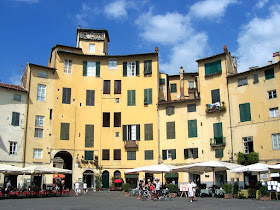 The Piazza dell'Antifeatro, on the site of a former  amphitheatre, is part of the charm of Lucca