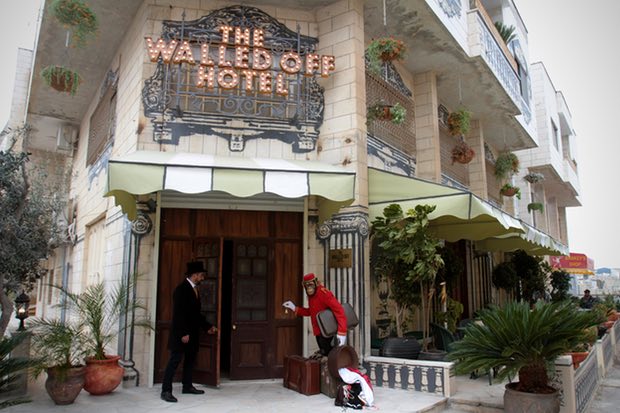 The Walled Off Hotel Banksy Opened His First Hotel Next To Bethlehem Wall