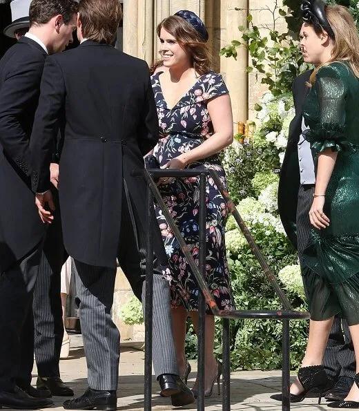 Princess Eugenie wore Peter Pilotto floral print dress. Princess Beatrice wore The Wampire's Wife leaf print midi dress