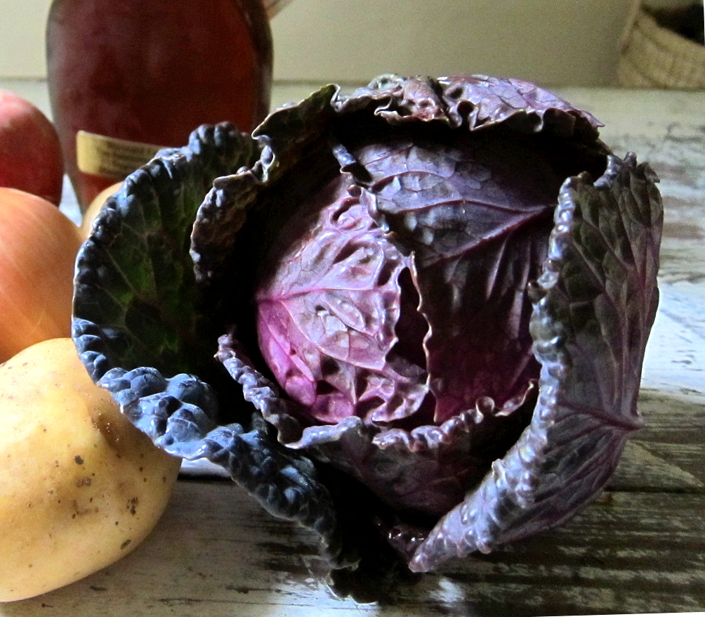 last call for corn red cabbage braised with apples, bacon, maple, and