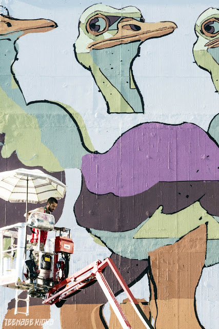 Spanish Street Artist Aryz at work on a new mural in Rennes For the Teenage kicks street art Festival. 2