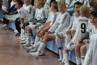 group of boy team kids in white adidas soccer socks