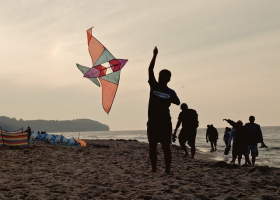 Flying a kite on the beach. Flying a kite on the beach.