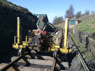 Laterally aligning the track using the muscleman