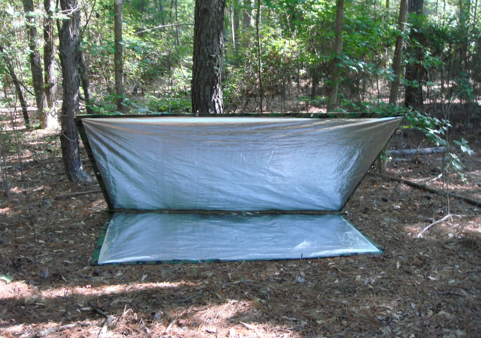 Sensible Survival Make an Inexpensive Reflector Tarp for a Warm