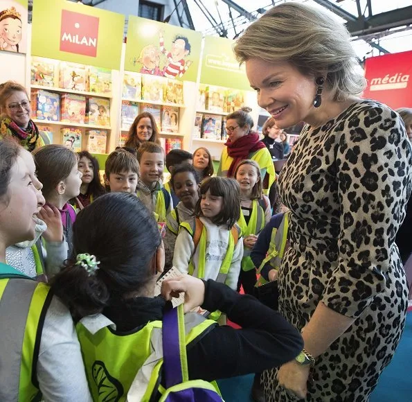 Queen Mathilde is wore her Natan leopard-print dress, Armani satin clutch