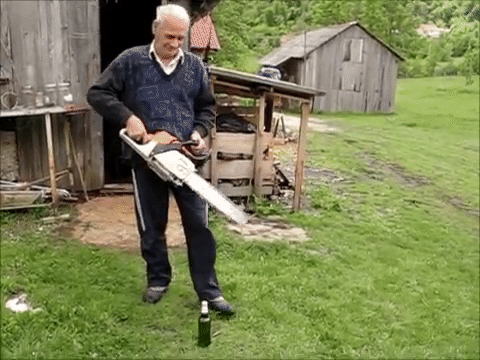 Watching This Man Open a Beer Bottle Using a Chainsaw without Breaking the Glass Is Oddly Satisfying Watching This Man Open a Beer Bottle Using a Chainsaw