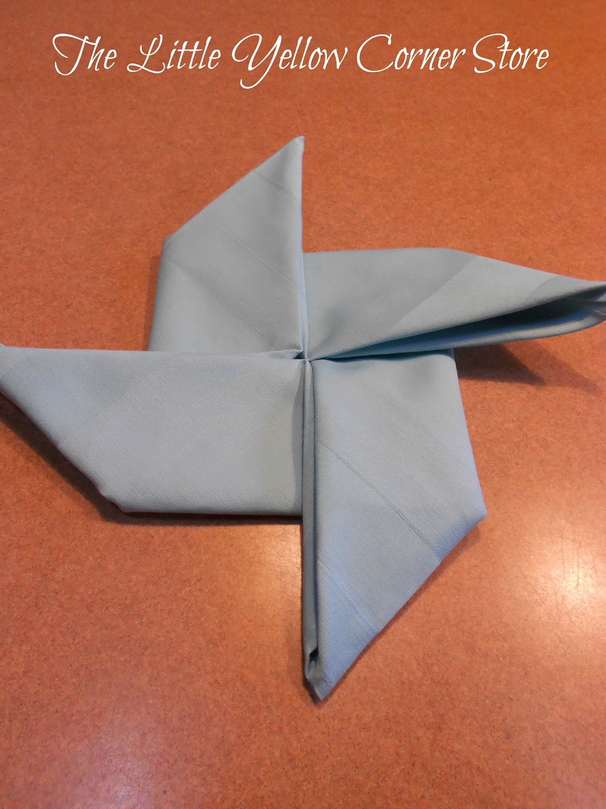 The Little Yellow Corner Store Summer Time Pinwheel Napkin Fold