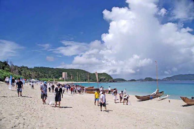 beach cleanup, boats, ocean, mountains, sky, sabani teams