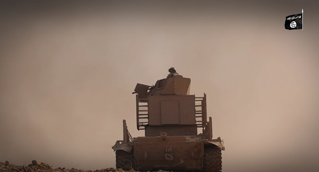  داعش تقوم بتحوير مدرعاتها : من عربات الانقاذ المدرعه الى  قلعه معركه !! الجزء الثاني  35023