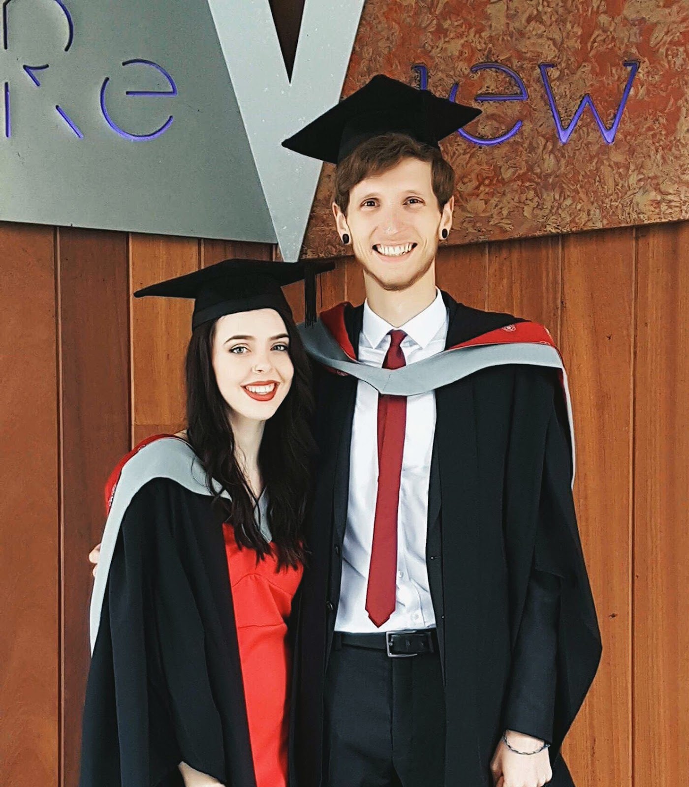 Girl graduating with boyfriend