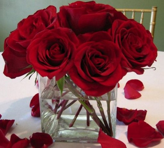 centros de mesa con rosas rojas