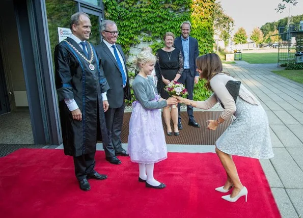 Princess Marie of Denmark arrived at Odense for a one day visit Princess Marie wore Lace dress