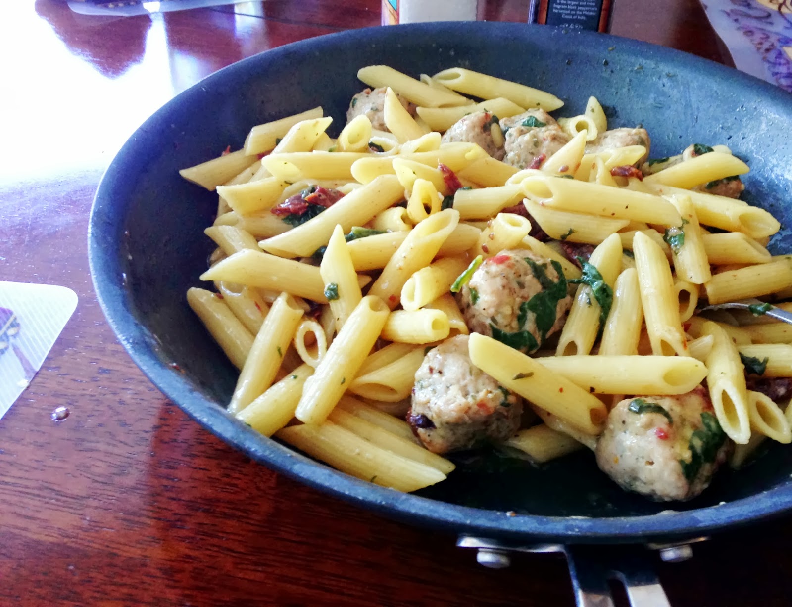 Spice and Rice Penne pasta with basil chicken balls