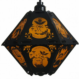 Good Lord Deliver Us, cries the poem of The Cornish Litany on this orange and black vintage style paper hanging pendant lantern