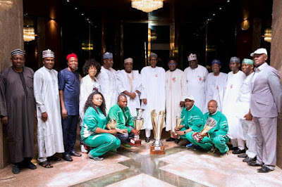 d Photos: President Buhari receives National Open Water Swimming Competition Trophy