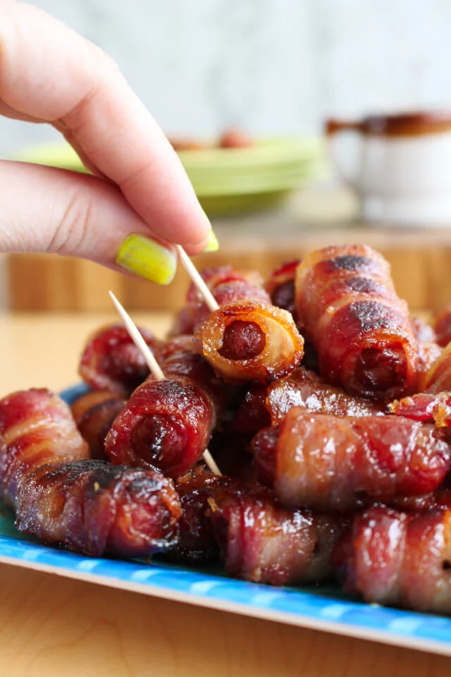 Brown Sugar Bacon Wrapped Smokies are a 3-ingredient appetizer that's always the first to disappear!  If you're making them for a party, I suggest a double batch.