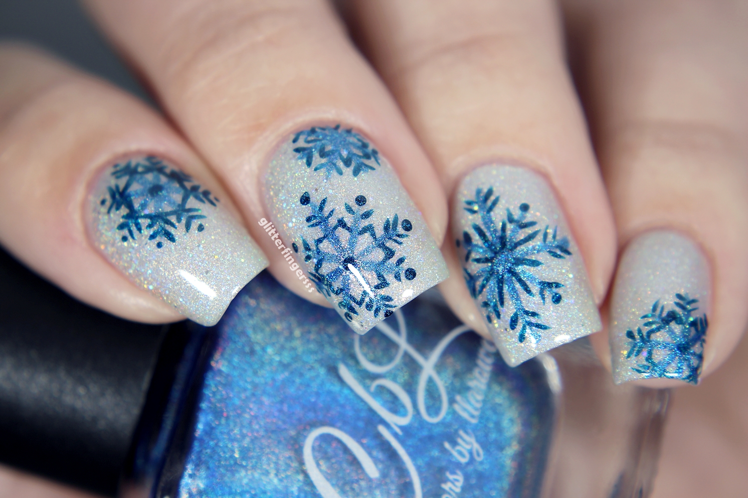 4. Glitter Snowflake Nail Art Ideas - wide 9
