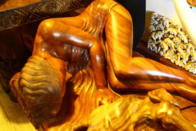 Wooden woman statue at Ubud Bali