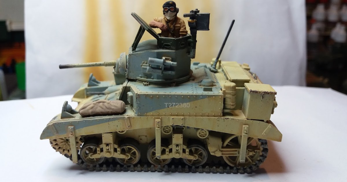Putting off painting Finished M3 Stuart tank in Caunter camouflage