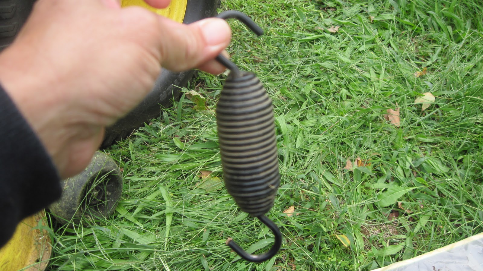 Holes In My Jeans John Deere GT235 idler arm tension spring