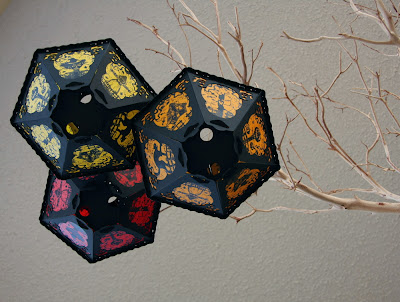 Shown in a tree are new June 2012 vintage style Lanterns by Bindlegrim