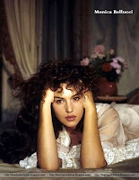 monica bellucci hot, she is laying on bed, white lingerie, unmatched picture