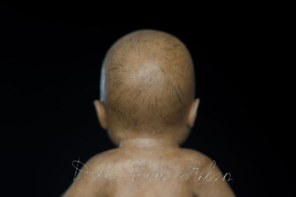 OOAK baby girl doll with painted hair, view of back of head