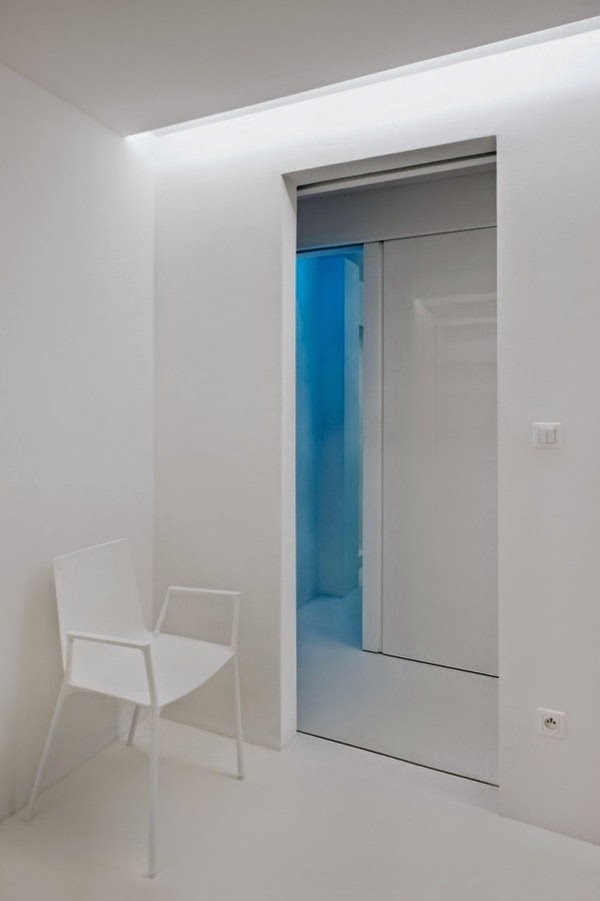 Renovated white apartment with futuristic interior design