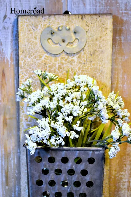 Cheese grater filled with flowers