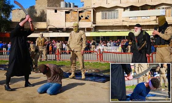 267F9D4600000578 0 image a 46 1425989270863 Photos: ISIS beheads three men with sword for being homosexuals