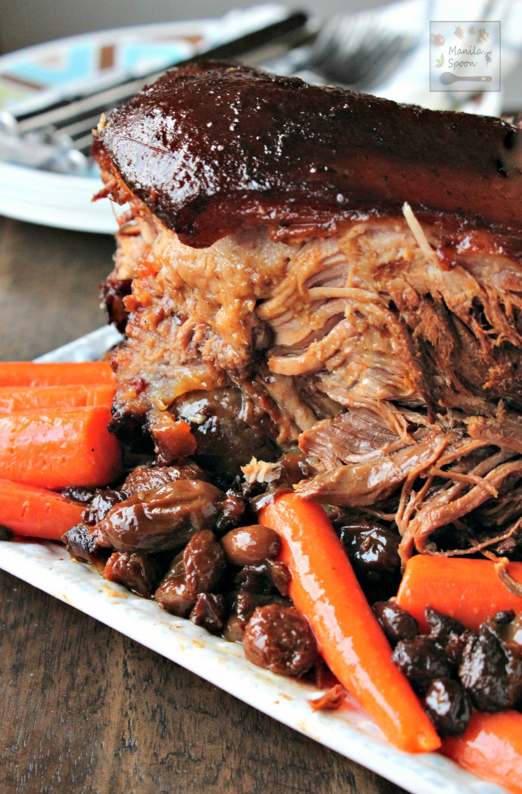 Melt-in-your-mouth, moist and delicious Slow Cooker Roast Pork with Dried Fruits that you'll make over and over again. Use a different variety of fruits - dried giant raisins, apricot, plums, cherries, etc. It's your choice. | manilaspoon.com
